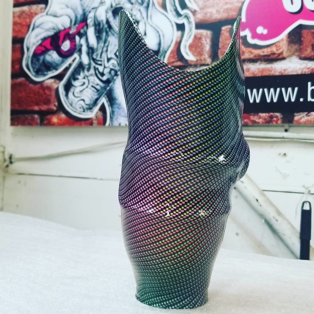 Prosthetic leg Hydro dipped in carbon fiber Film